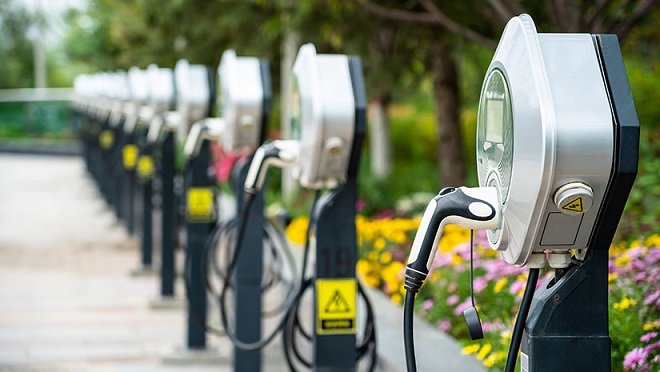 Transitioning to Sustainable Transportation: The Role of DC Fast Charging Stations
